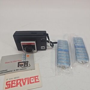 VINTAGE 1970s KODAK INSTAMATIC X-15F CAMERA w/2 UNUSED GE FLIP FLASH